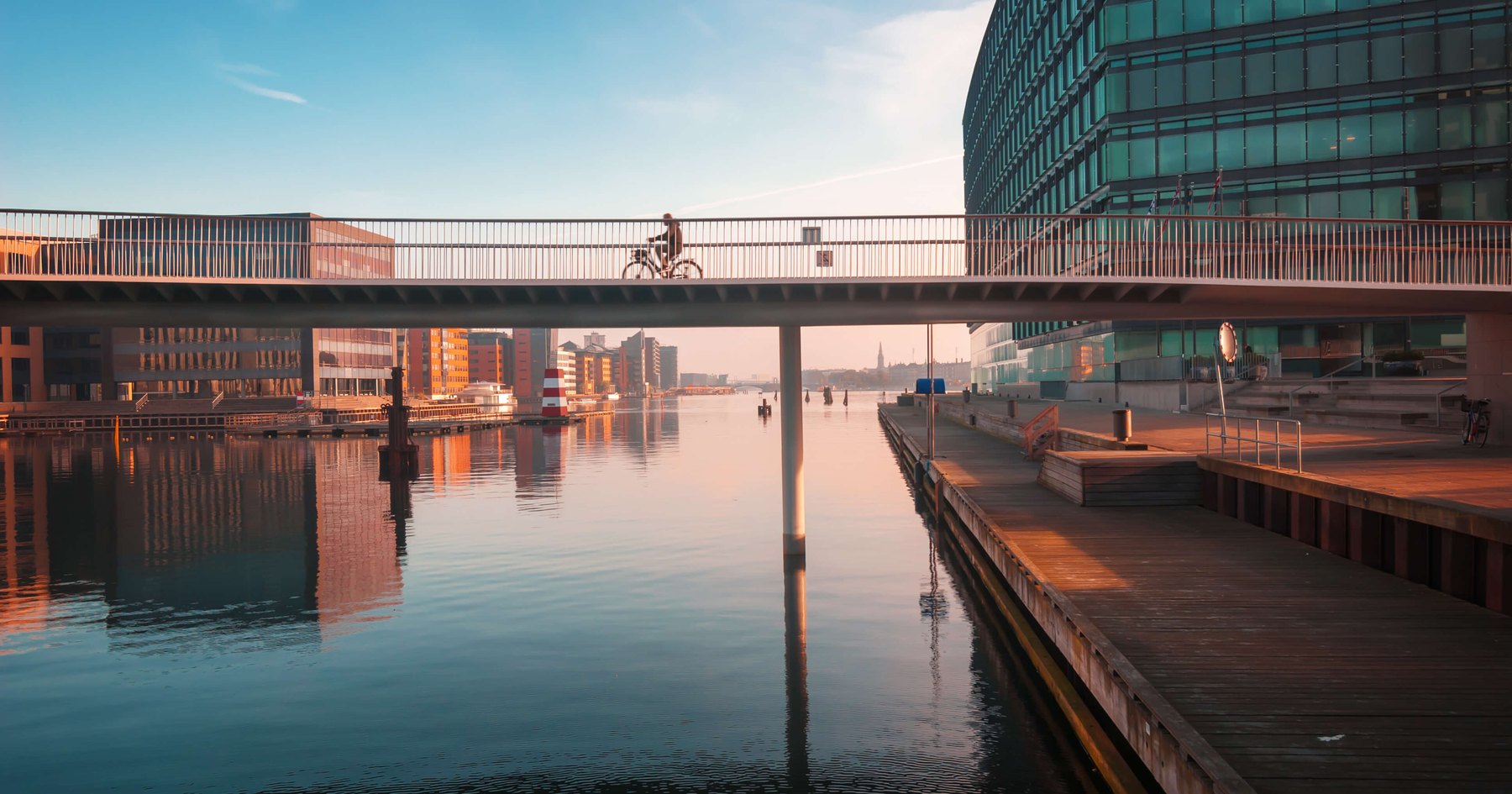 Cyclist crossing a bridge in Copenhagen